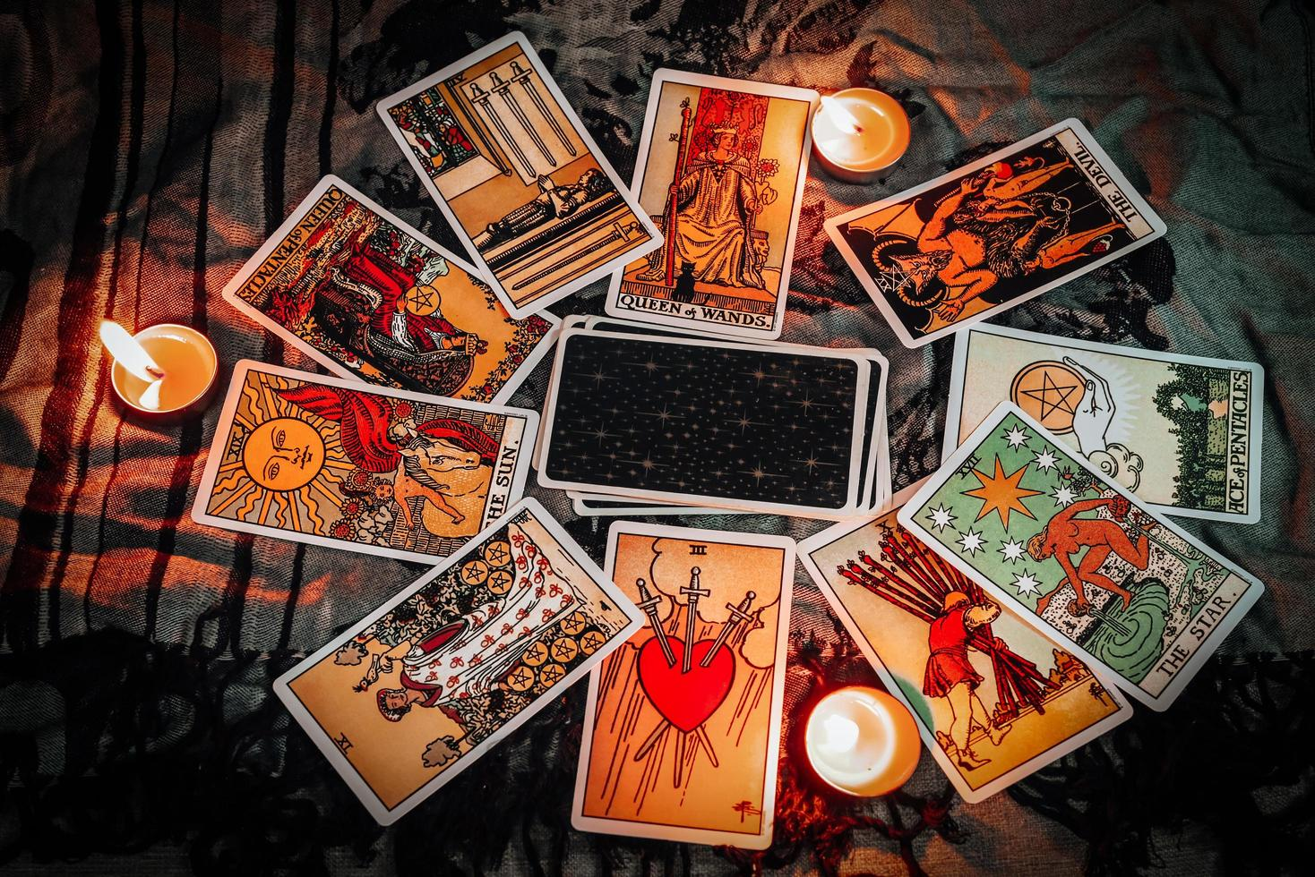 Tarot cards with candles